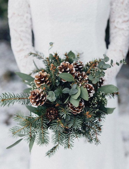 a-simple-and-cozy-winter-wedding-bouquet-of-evergreens-eucalyptus-and-snowy-pinecones-6440898